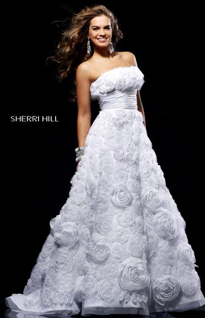 A stunning white rosette textured wedding dress!